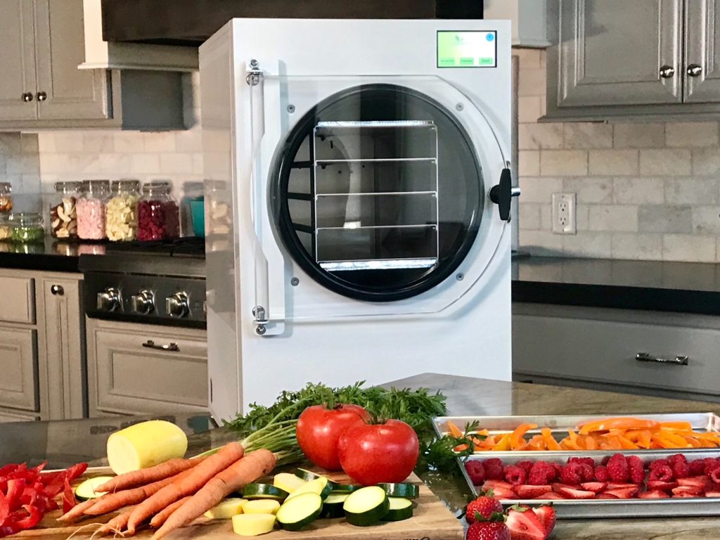 freeze dryer with food in front of it