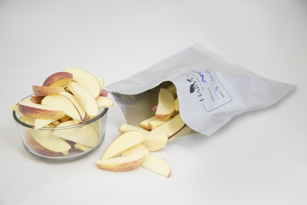 freeze dried apples in a bowl and in a mylar bag