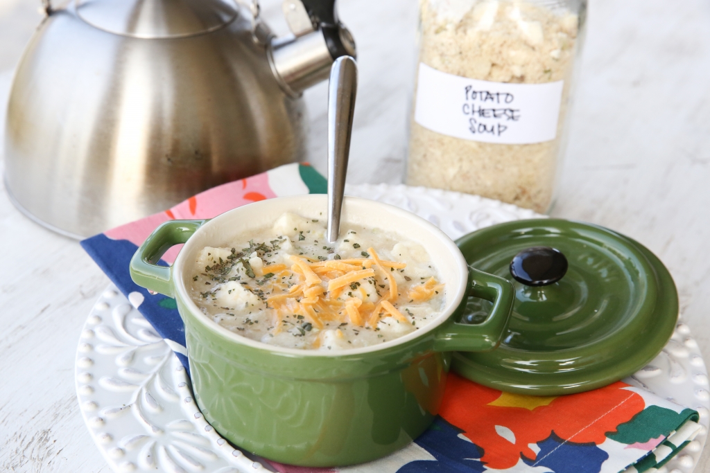 potato soup in a green bowl