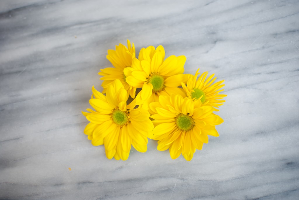 five yellow flowers
