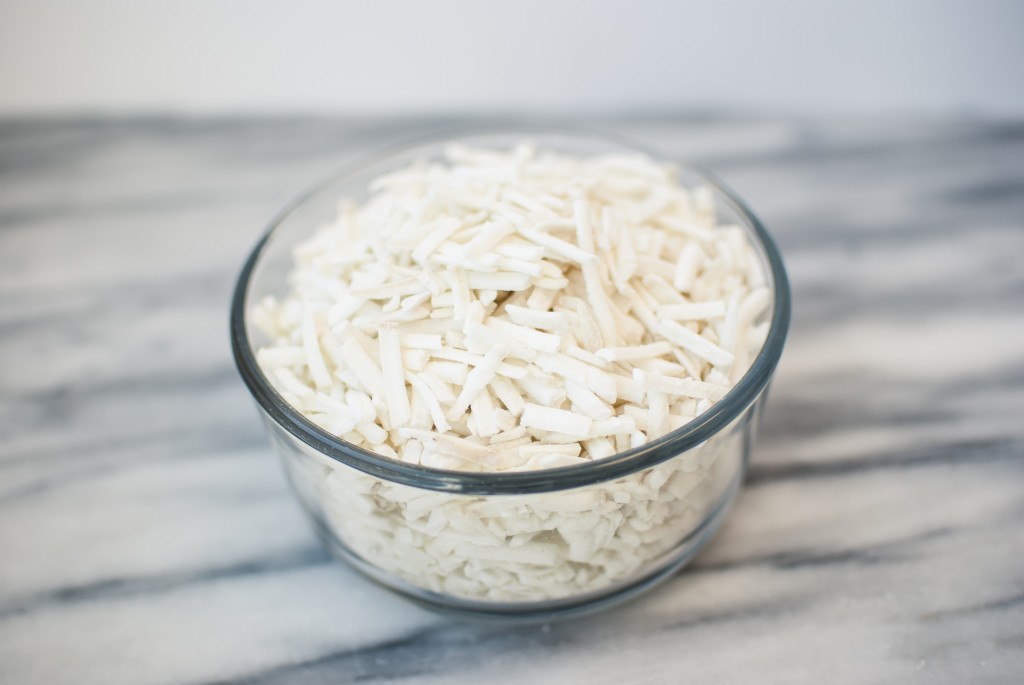 freeze dried shredded cheese in a glass bowl