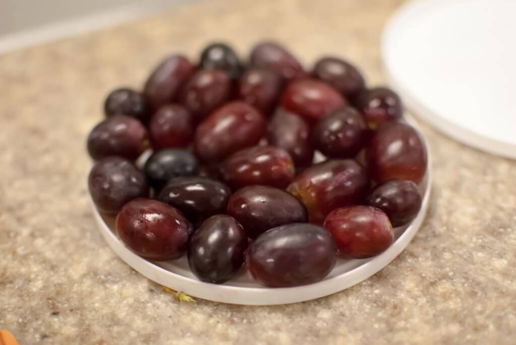 grapes on a small plastic tray