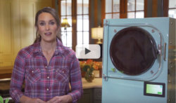 video thumbnail of a woman standing next to a light blue freeze dryer