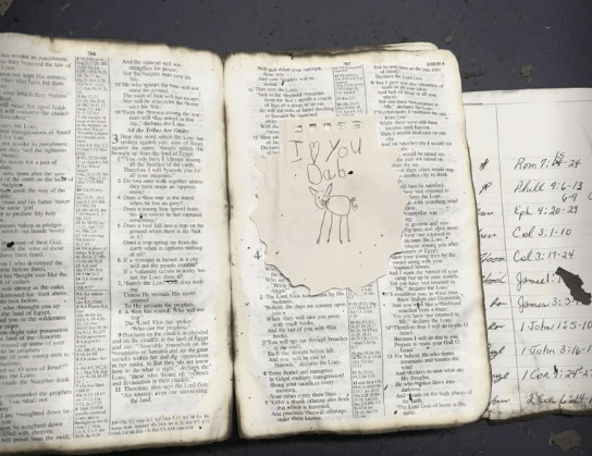 pages of a bible and a love note from a child