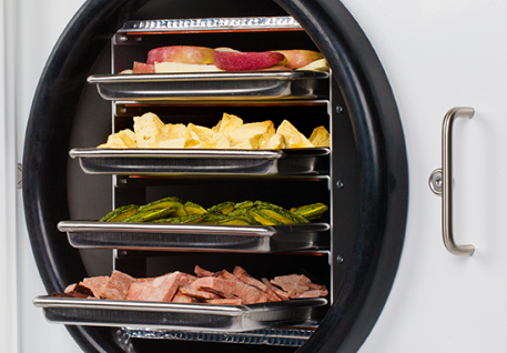 food on trays in a Harvest Right freeze dryer