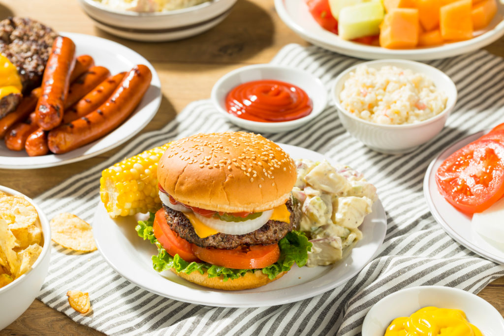 plates of various foods from a cookout